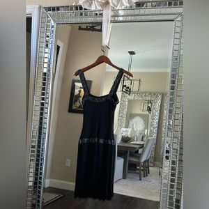 Black cocktail dress with fringe bottom
